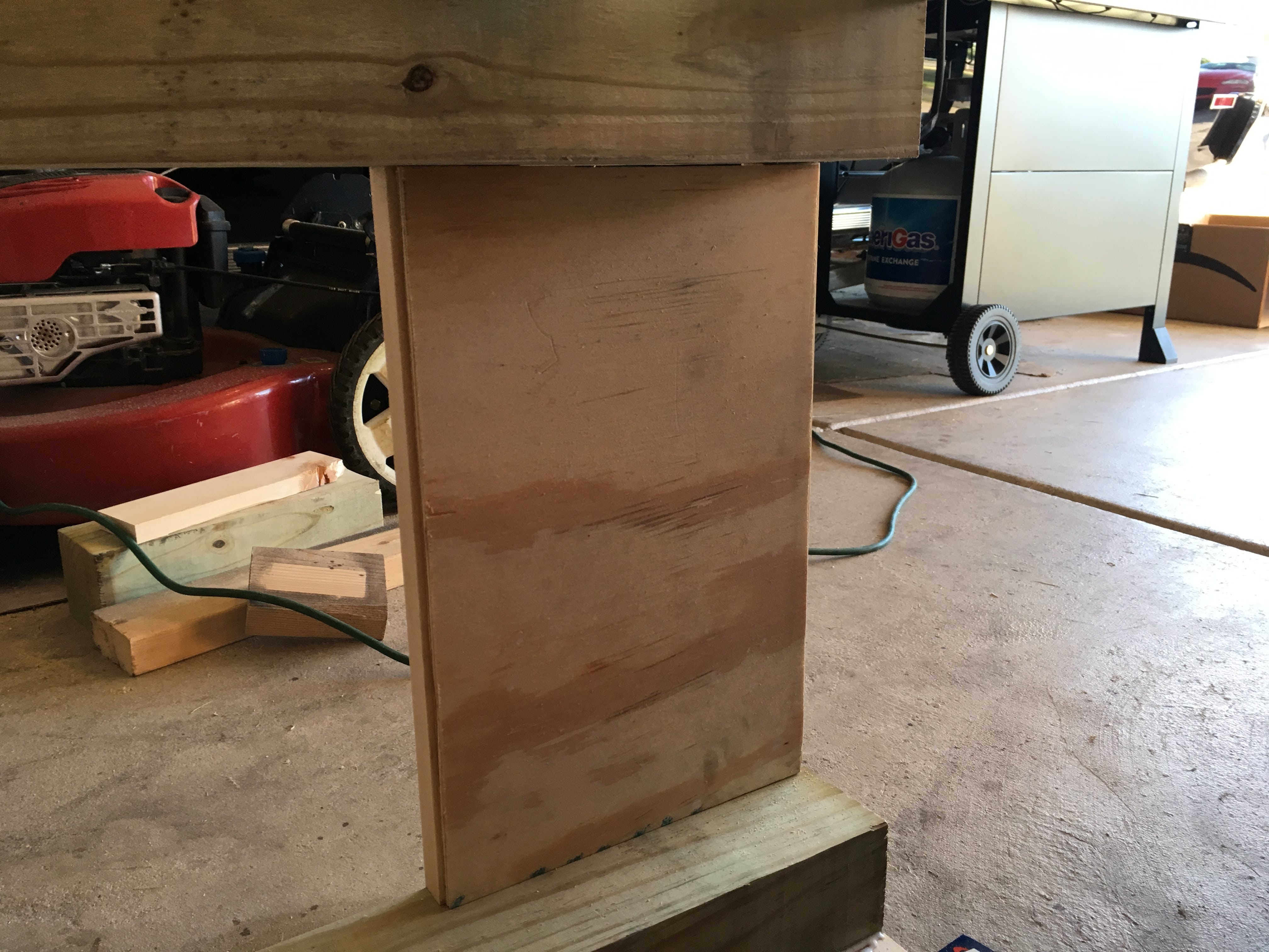 backside of vanity sides with plywood